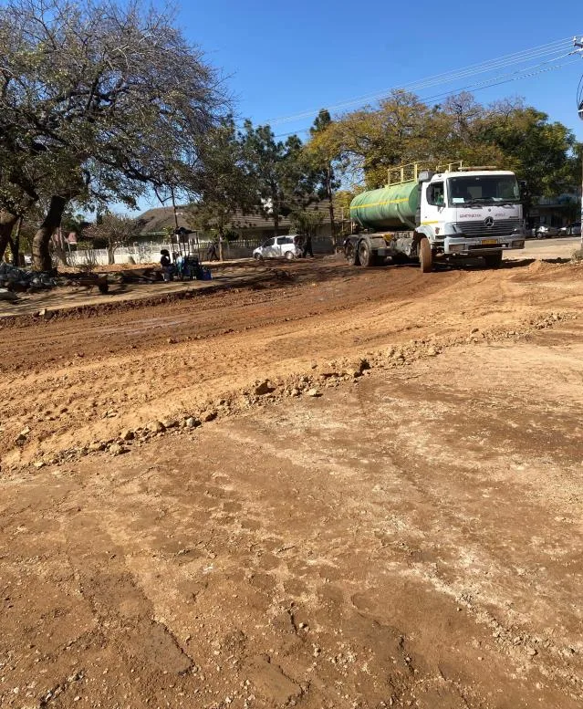 Water bowser moisturising the road base on the Rerekai Tagwena project