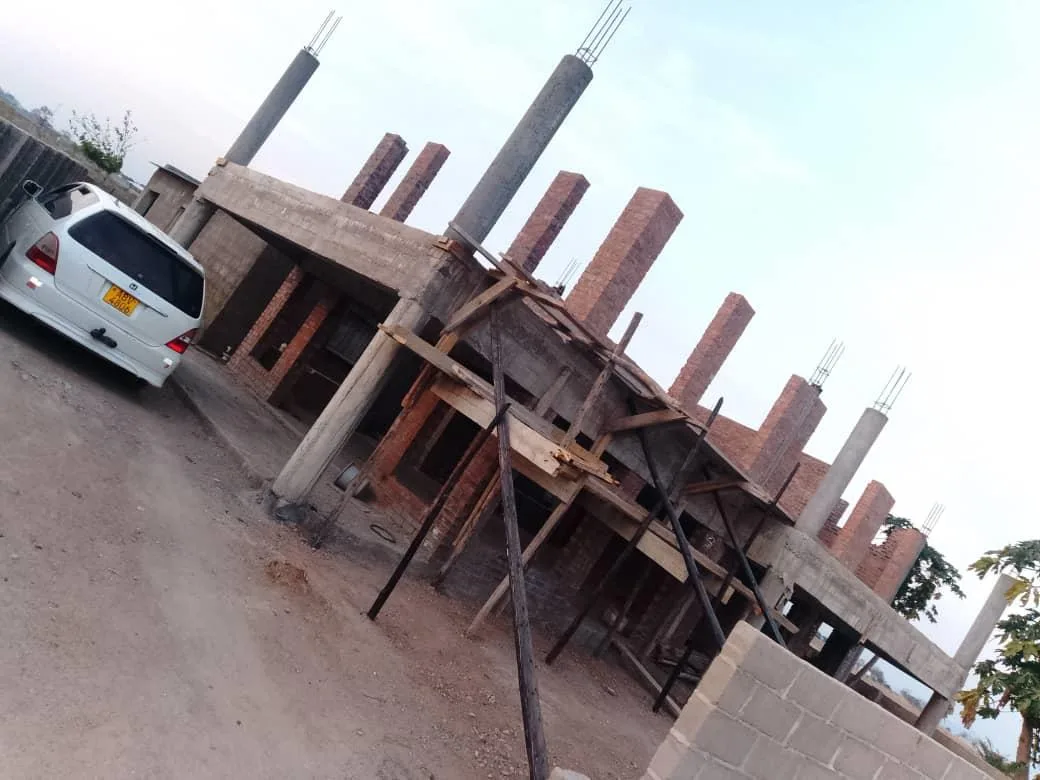 Double-storey house with first-floor columns and formwork going up